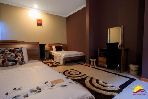 triple_bedroom_shine_country_resort_hotel_uganda_central_region2