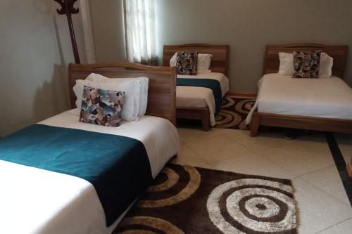 triple_bedroom_shine_country_resort_hotel_uganda_central_region3